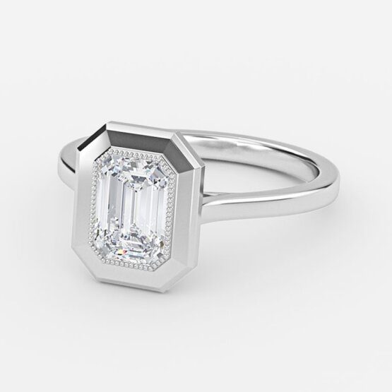 bezel set emerald cut emerald ring